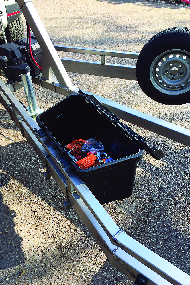 Vanclaes boat trailer drawbar with lockable storage box, winch battery setup and towing wheel on stainless steel frame.