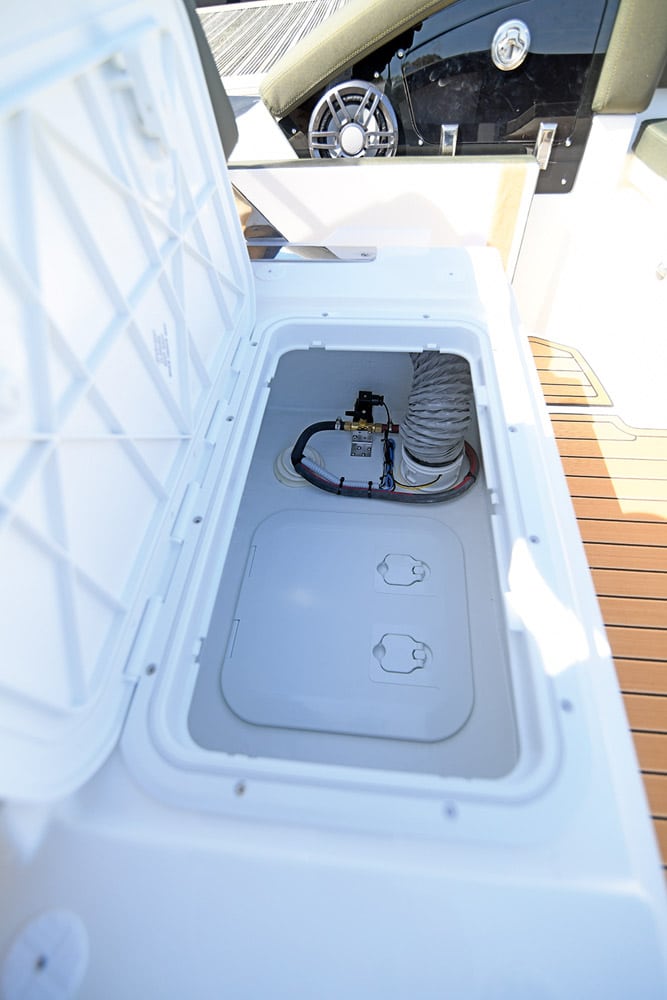Access to the bilge blower, bilge and fuel pump under the helm seat.