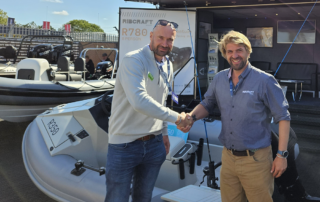Nick Edgington (left), Sales Director for RAILBLAZA, congratulates Olly Stevens (right), Global Sales Manager for Ribcraft, on the launch of the new Ribcraft 350 Adventure RIB.
