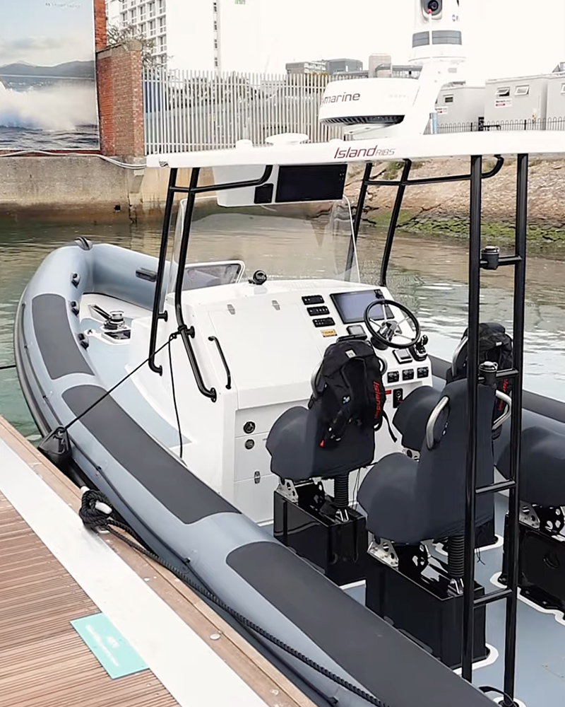 View inside 10m Island RIB showing seats and steering console