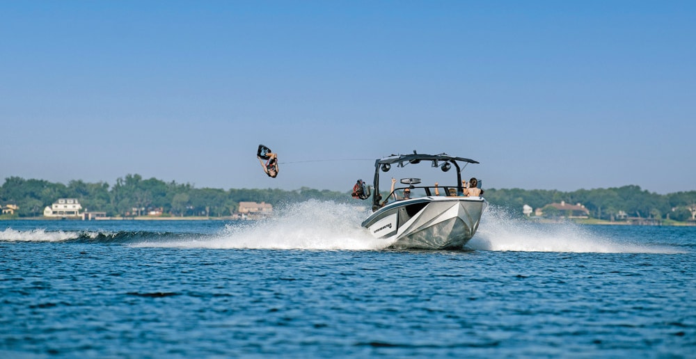 Powerful torque from electric motors makes it easy to rapidly pull a wake-boarder out of the water. © Jason Lee/Nautique