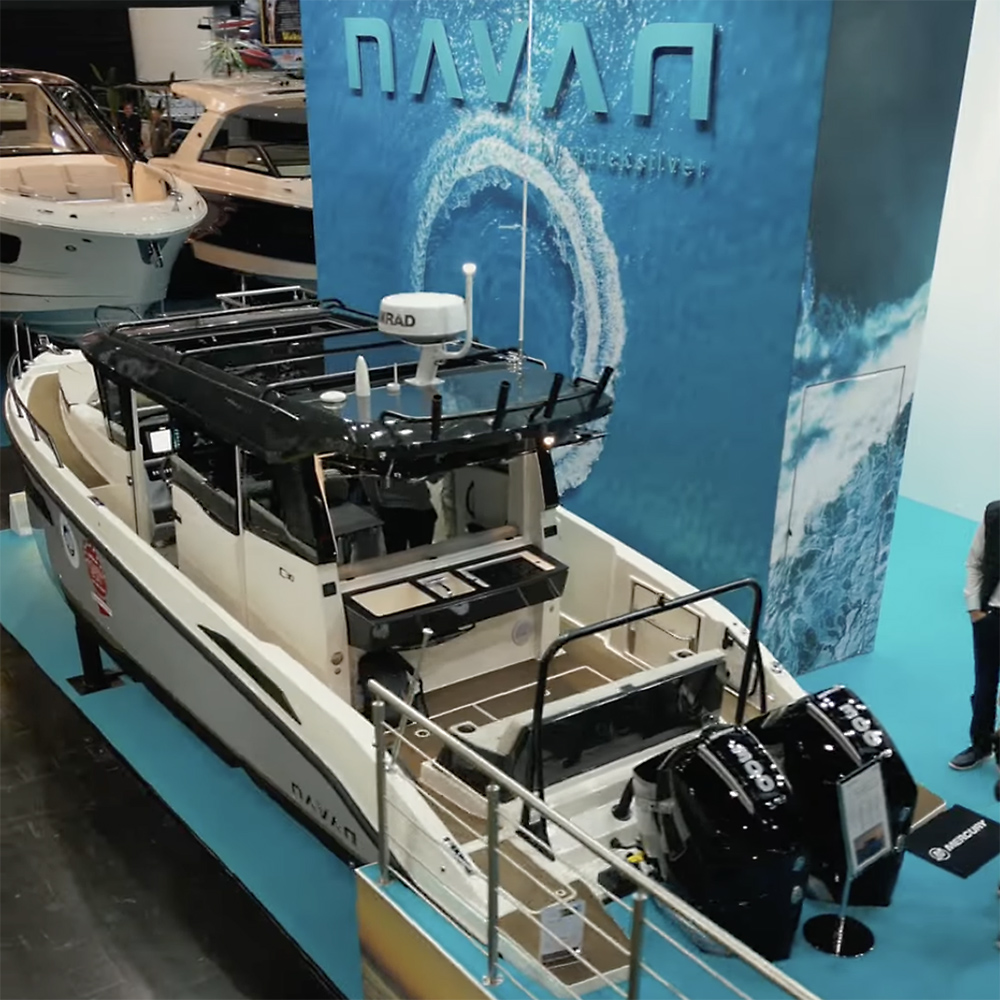 navan boat show stand showing boat and blue backdrop