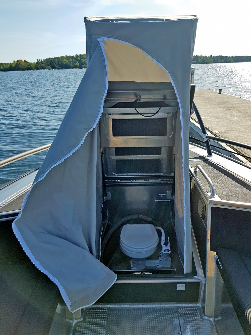 A jack-in-the-box heads sits in the forepeak.