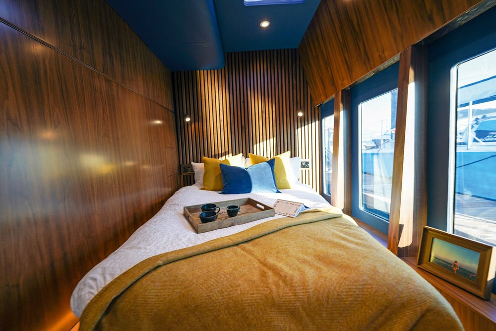 You are greeted with light and space and a double bed in the main cabin.