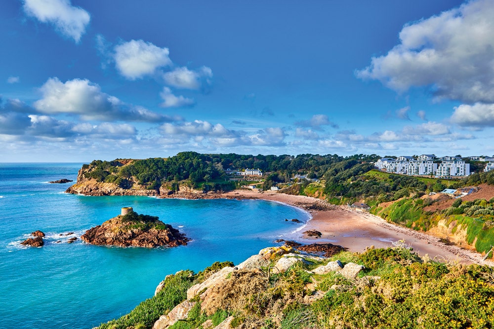 Making the Leap - Cruising to Jersey - La Portelet bay with Janvrin's Tomb and beach, Jersey CI.