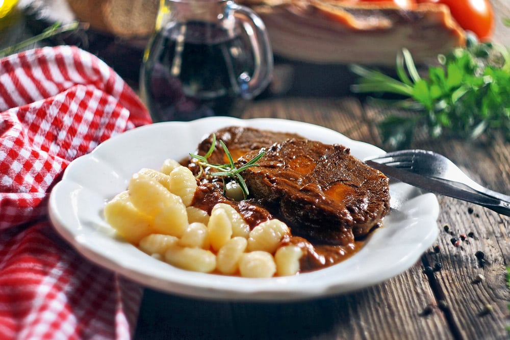 Pasticada with gnocchi, beef stew in a sauce. Croatian cuisine