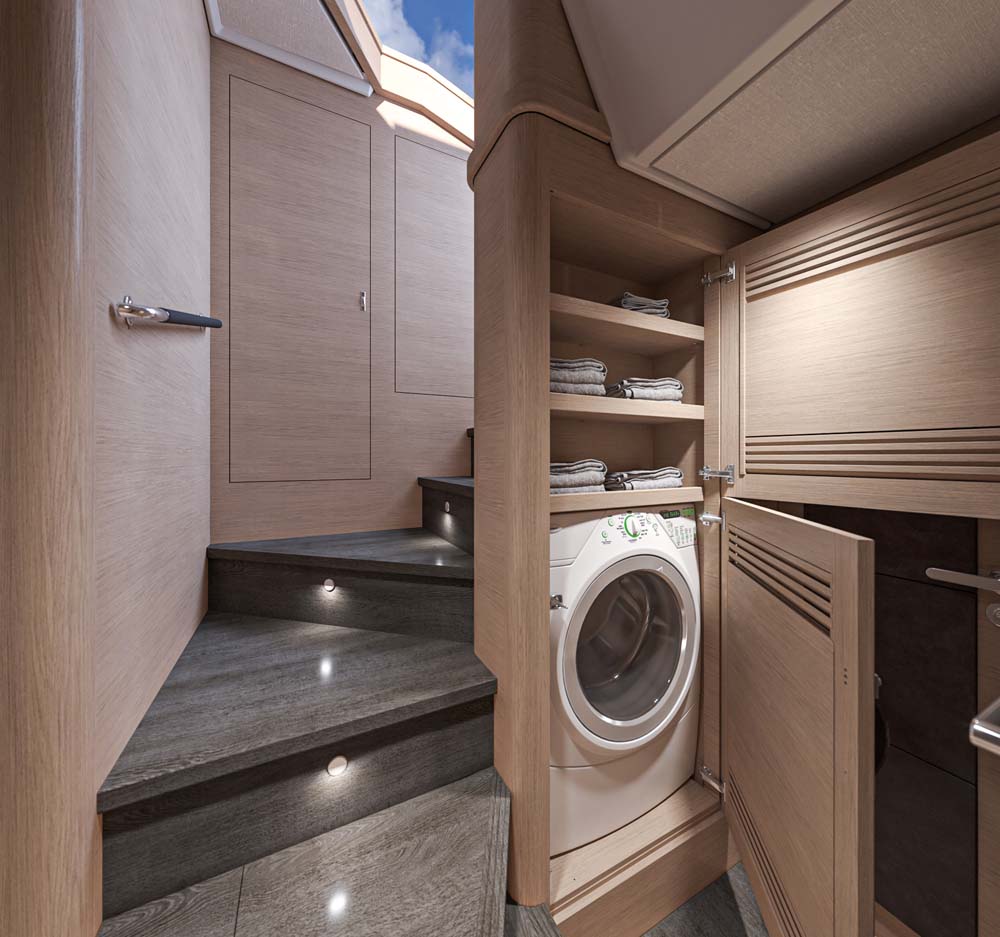 Beneteau Swift Trawler 54. The washing machine hides under the companionway steps.
