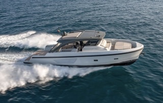 Bluegame 54 voyaging across water.