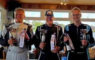 Colin Jelf holding the winning trophy along with Ian Blacker and Steve Hoult who came second and third in the championship.
