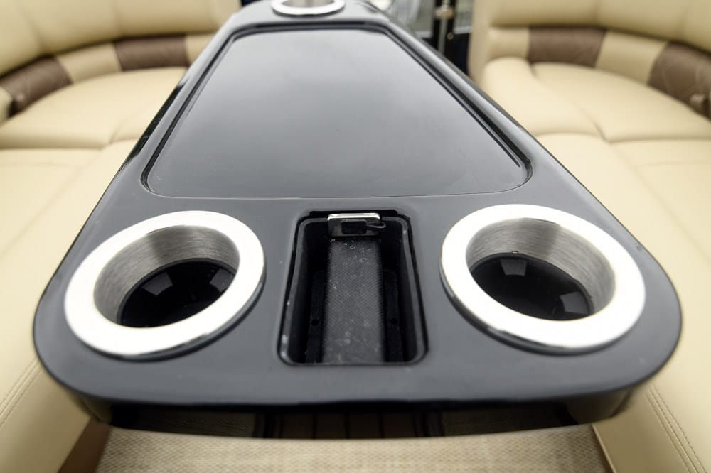Regency 250 LE3 Sport Pontoon Boat. A USB socket sits in the middle.