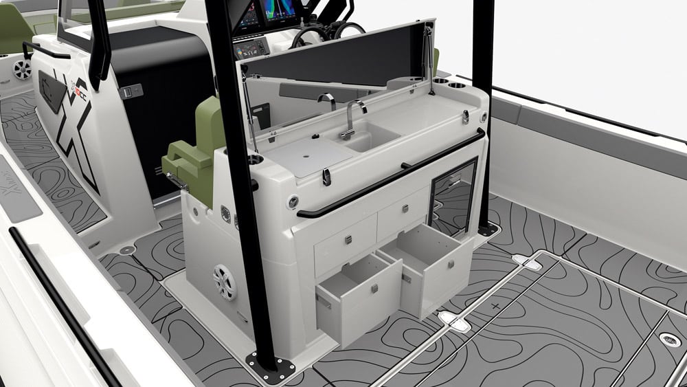 Zodiac X10CC. The bulwark/half-sponson design makes a big galley possible.