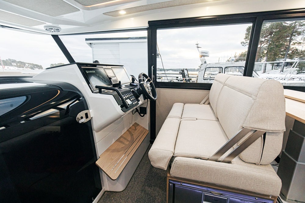 Quarken 35 Cabin. Helm seating is generous. 