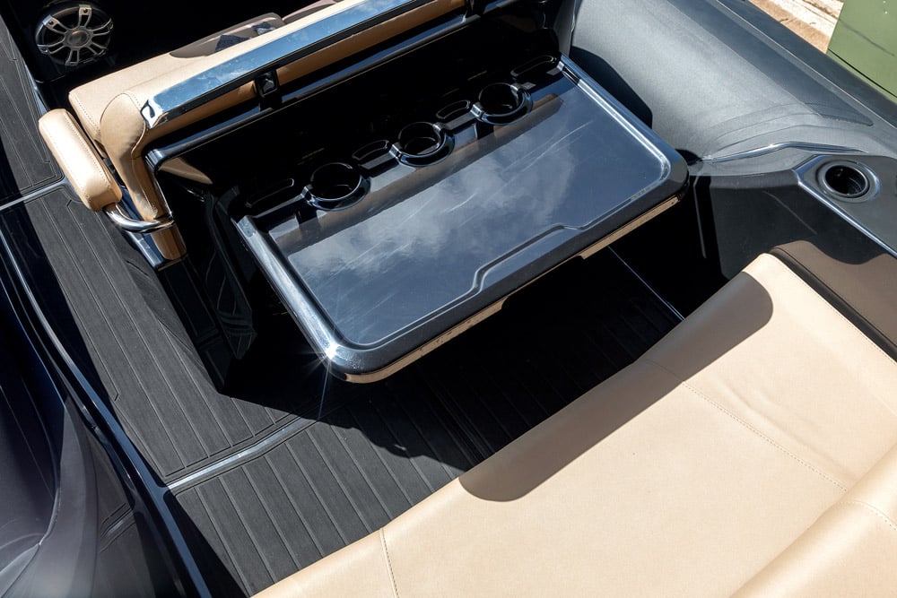 Fold-out table with cup holders on the BRIG Eagle