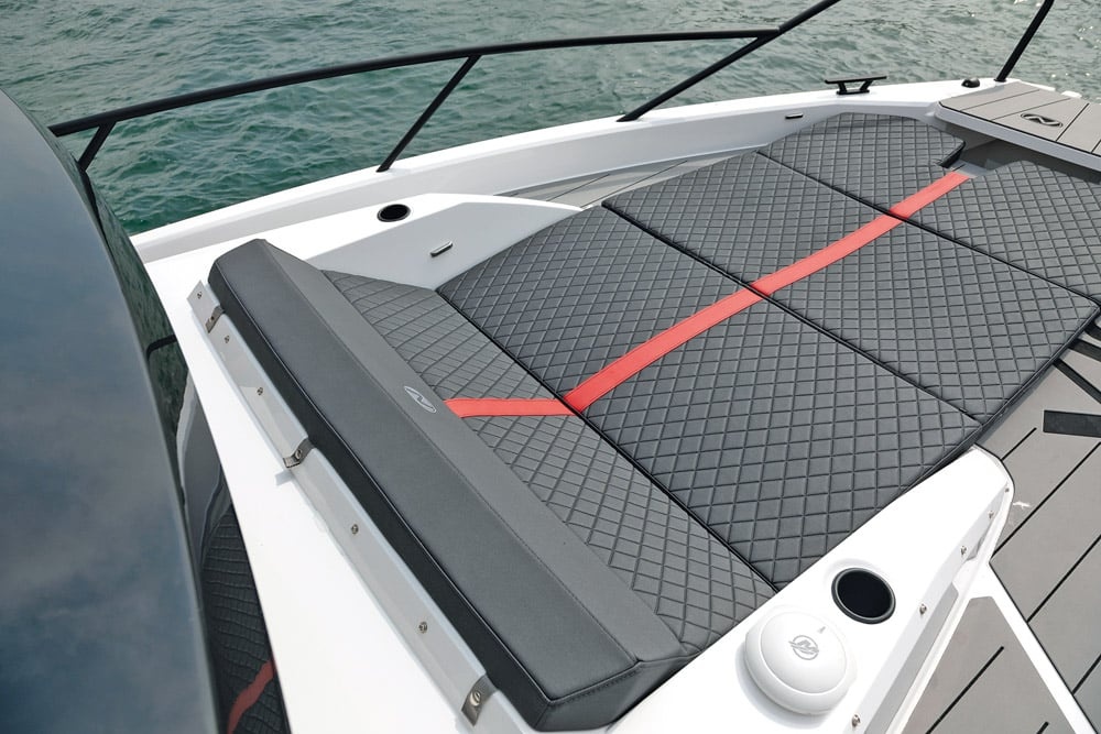 Comfortable sun lounger complete with drinks holders.
