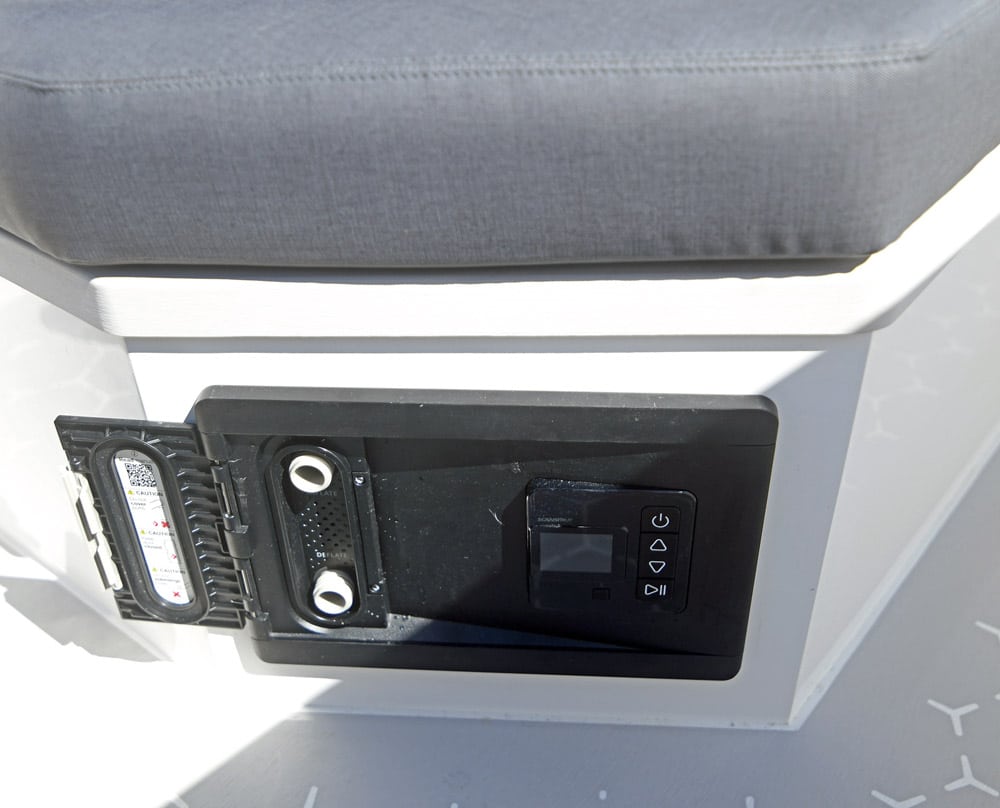 Ring 1080 Trophy. A 12V air pump sits neatly under the forward seat. 