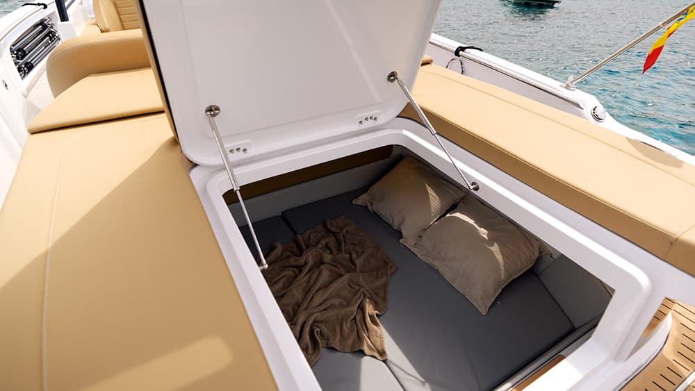The cabin access is through the sunbed. 