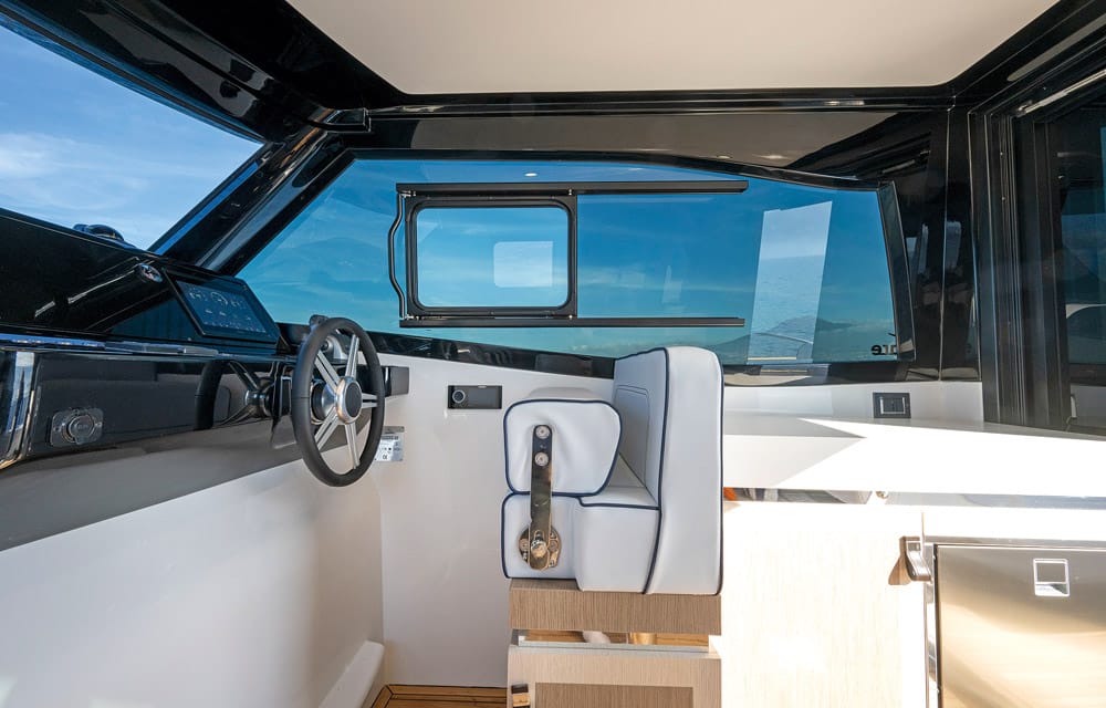 Gozzo Cabin 38. The helm is really a wide one-seater.