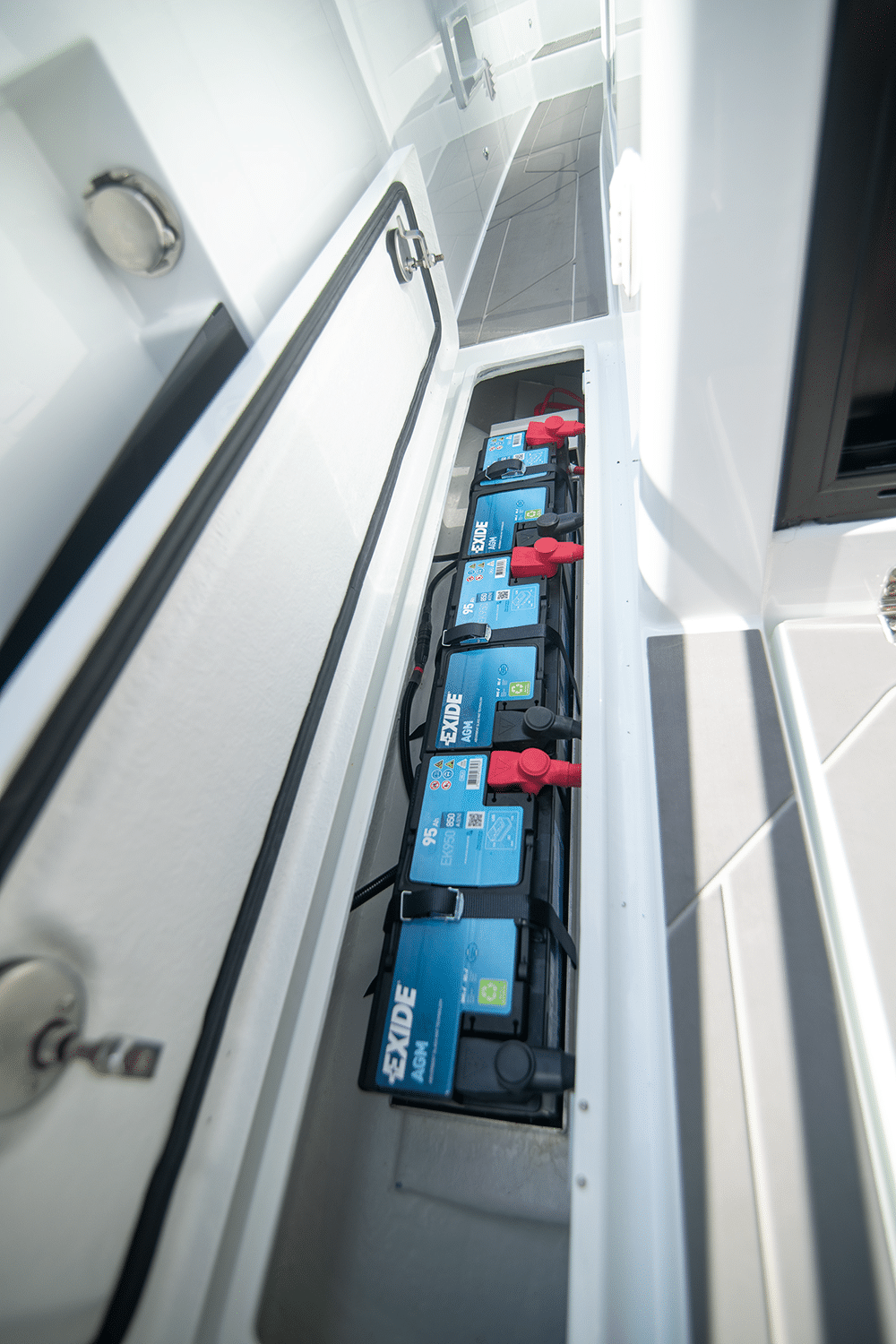This battery locker needs a gas strut.