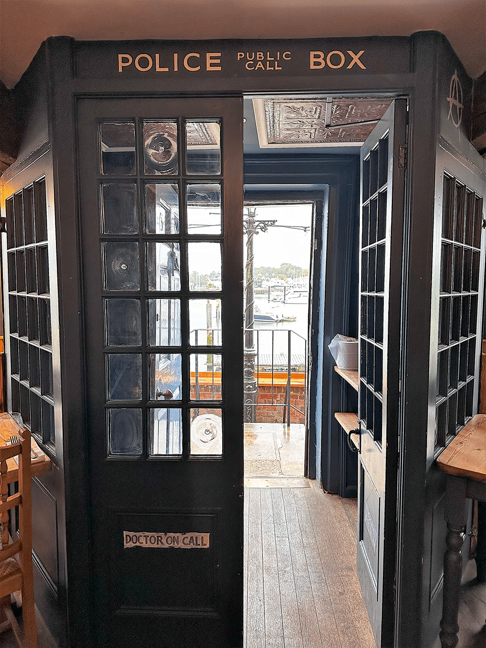 Step through the Tardis doors to the Jolly Sailor`s sunlit terrace.