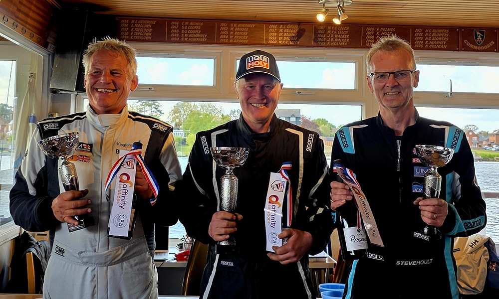 Colin Jelf holding the winning trophy along with Ian Blacker and Steve Hoult who came second and third in the championship.