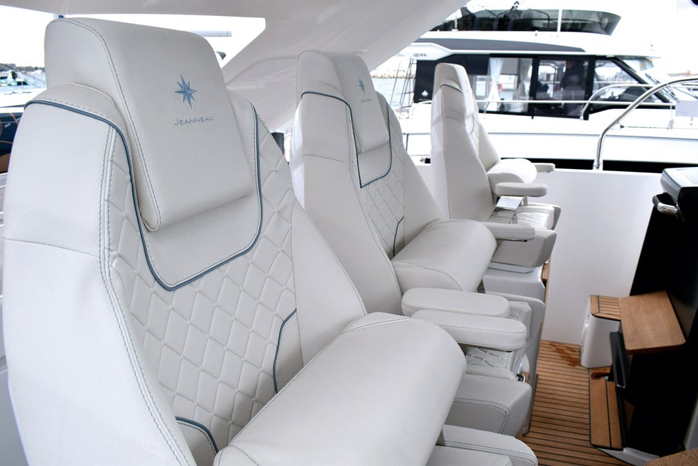 Comfortable & sturdy cockpit seats feature embossed `stitching`.