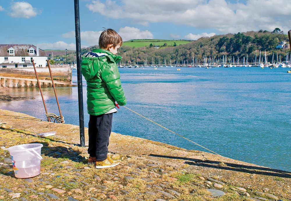 Dartmouth, River Dart. Crab fishing off Bayard`s Cove quay