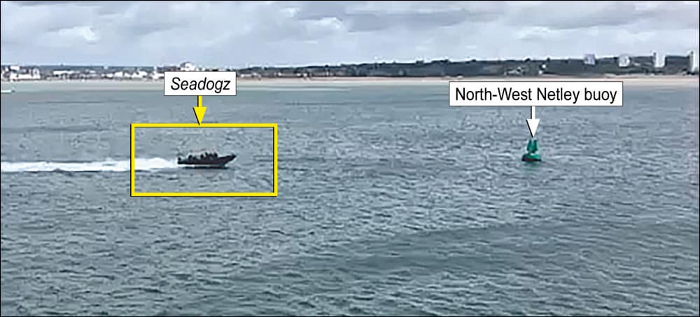 Fig. 7 - The commercially operated RIB Seadogz approaching the navigation buoy at high speed in Southampton Water. © H Tuck. MAIB Report