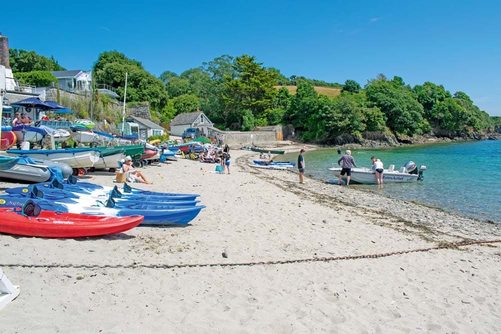 Helford Passage beach is a hive of activity. 