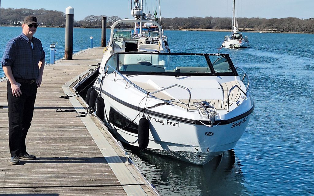 Owner stood with his Nordkapp Noblesse 830 boat