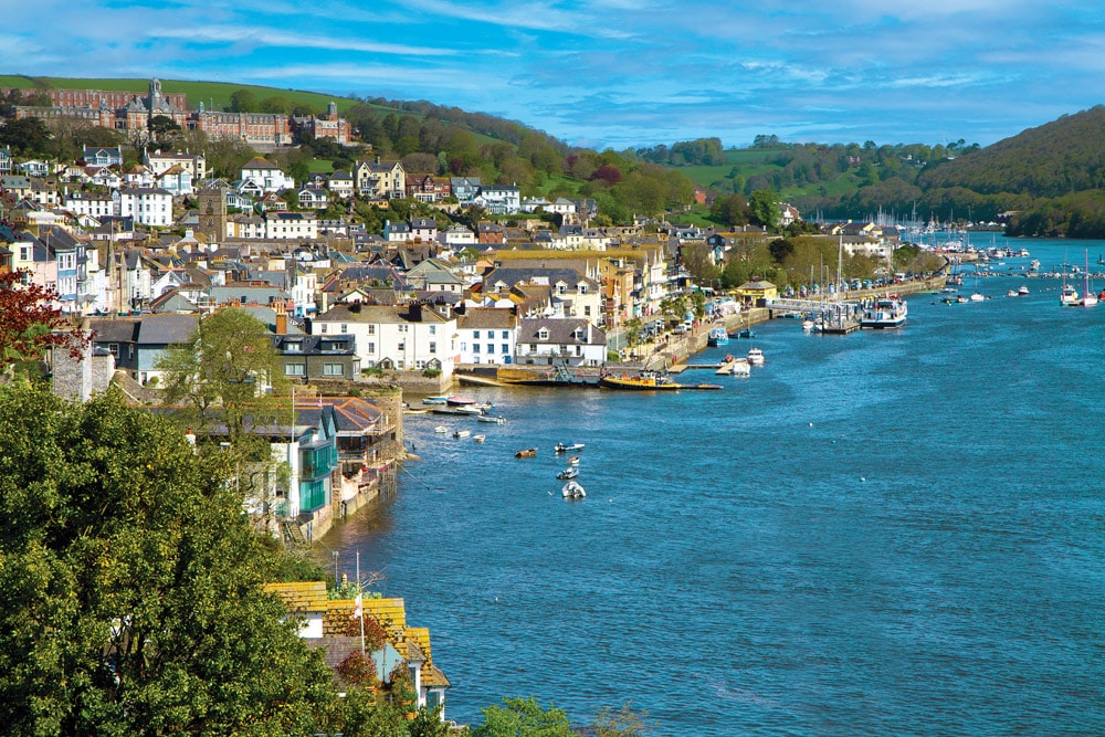 Dartmouth in Devon and the River Dart. The historic maritime town and home to Dartmouth Naval College. Dartmouth © iStock-acceleratorhams