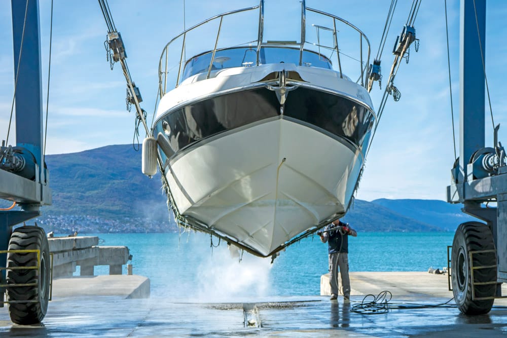 Lifting out is necessary for larger craft, boat wash would negate this.