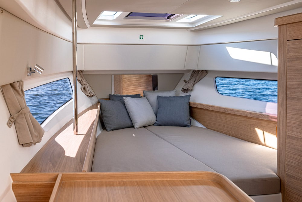 Master cabin with associated shower and heads in the Nimbus W11. Offshore Powerboats