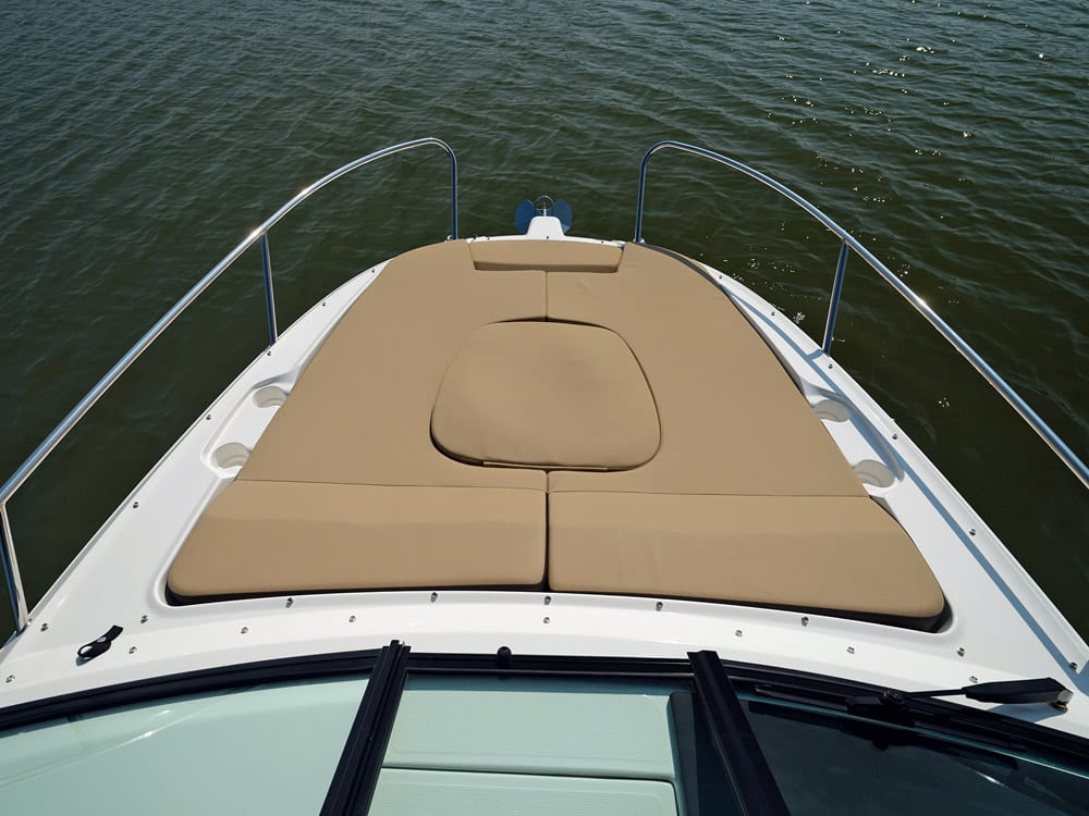 Bow cushions are recessed so they don’t blow off when underway. 