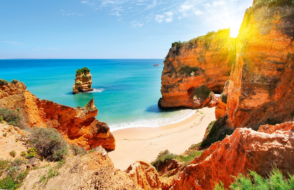 Rocky beach at sunset, Lagos, Portugal