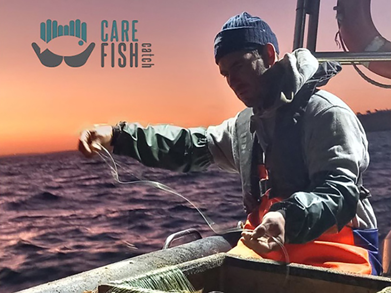 Fisherman prepares longline hooks at dawn, focusing on humane fishing practices.