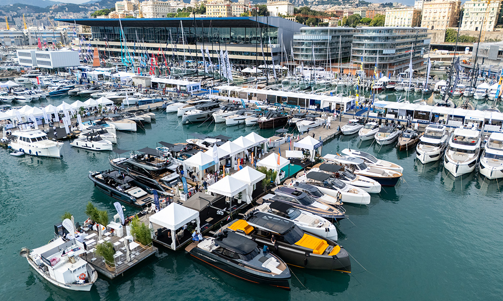 Genoa International Boat Show marina display featuring, sailing boats, exhibition tents, and more along the waterfront.