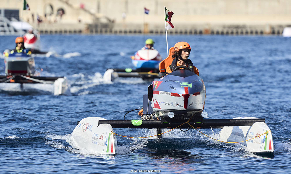 Foiling electric boats racing at the Monaco Energy Challenge 2025, showcasing sustainable marine technology and innovation.