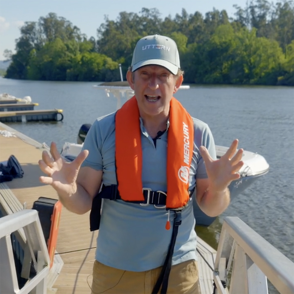 Hugo Montgomery-Swan standing on a pontoon for the introduction video to the Brunswick event