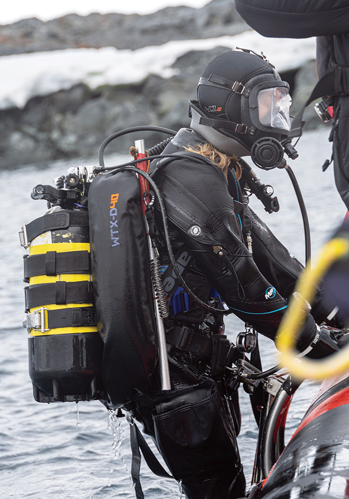 Diver climbing into a boat
