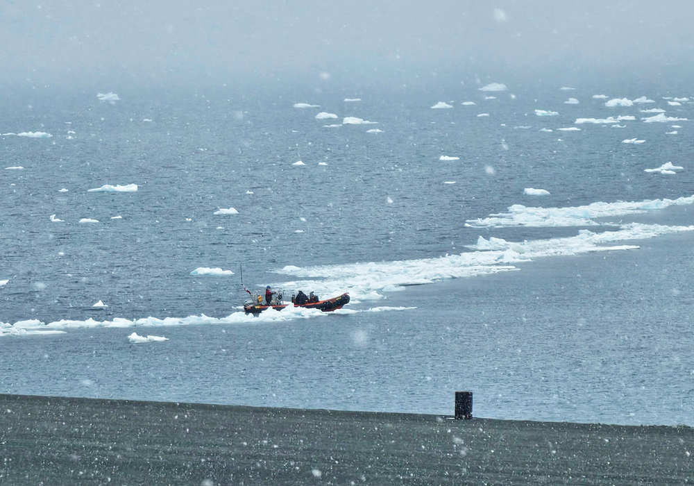 A Humber RIB travelling through a band of brash ice during a plankton trawl.