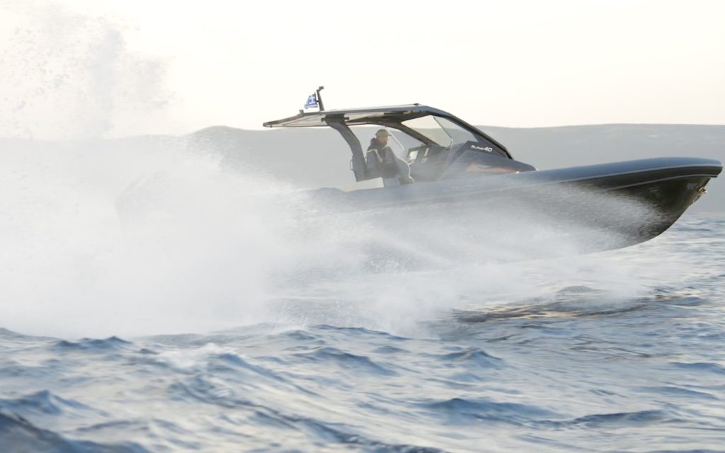 Technohull Alpha 40 jumping through the waves