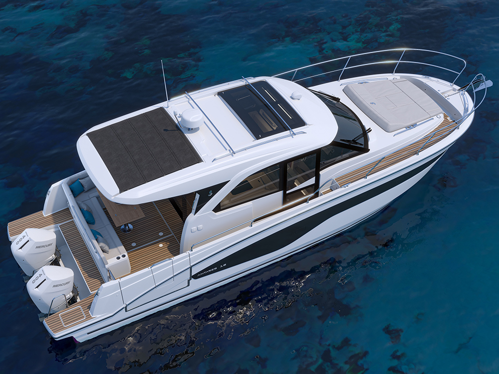 Top-down view of Antares 12 Coupe, showing sunroof, foredeck sunpad, and open aft deck with twin Mercury 400 outboards.