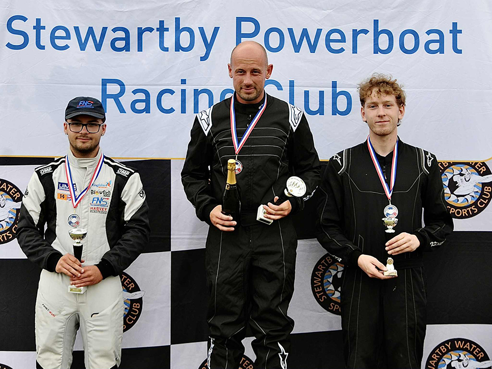 Podium winners at Stewartby Powerboat Racing Club, with Ben Morse centre celebrating his 19th British title alongside fellow competitors.