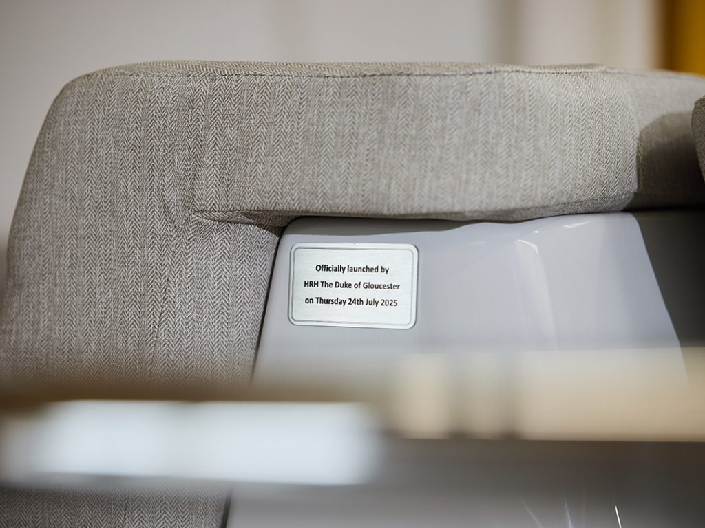 Commemorative plaque on the Origin 57 tender helm.