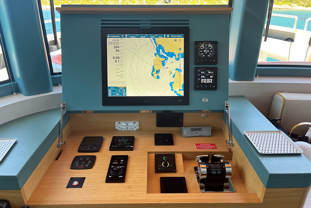 Second helm to Arksen 85 showing folding up lid and instrumentation below.