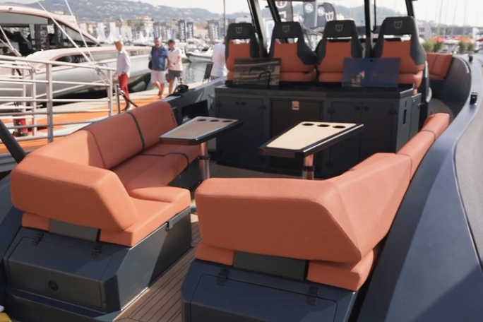 Orange and charcoal Lekker boat on display on at Cannes boat show