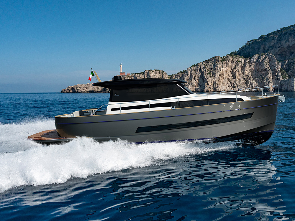 Apreamare Gozzo 48 Cabin cruising off the coast.