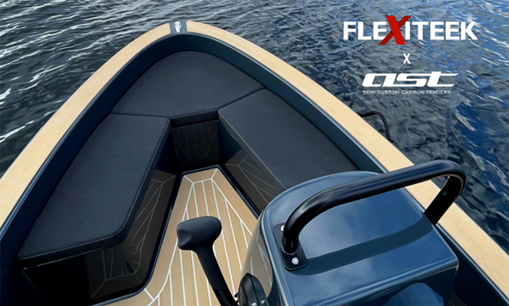 Carbon tender with Flexiteek 3.5mm synthetic teak decking and black seating, shown on water with Flexiteek and AST logos.