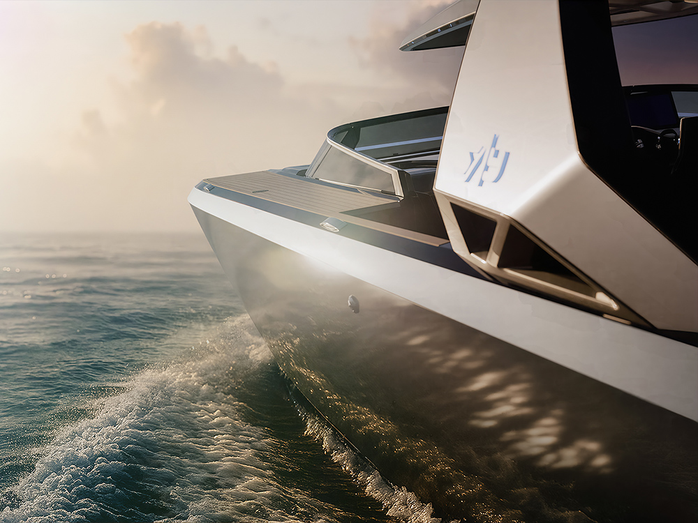 SAY 52 carbon yacht cutting through waves at sunrise.