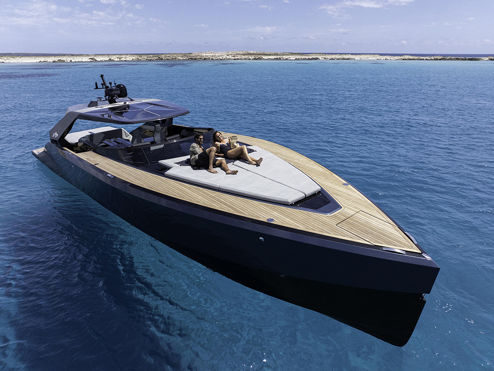 SAY 52 carbon fibre yacht with sunbathing deck cruising turquoise waters.